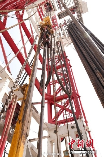 我國首口萬米科探井——中國石油深地塔科1井